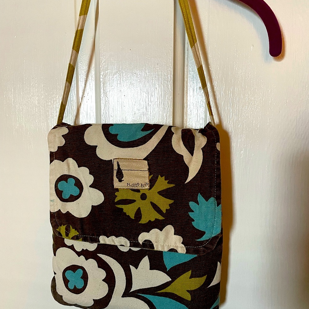 Flipped Bird brand mini reversible purse